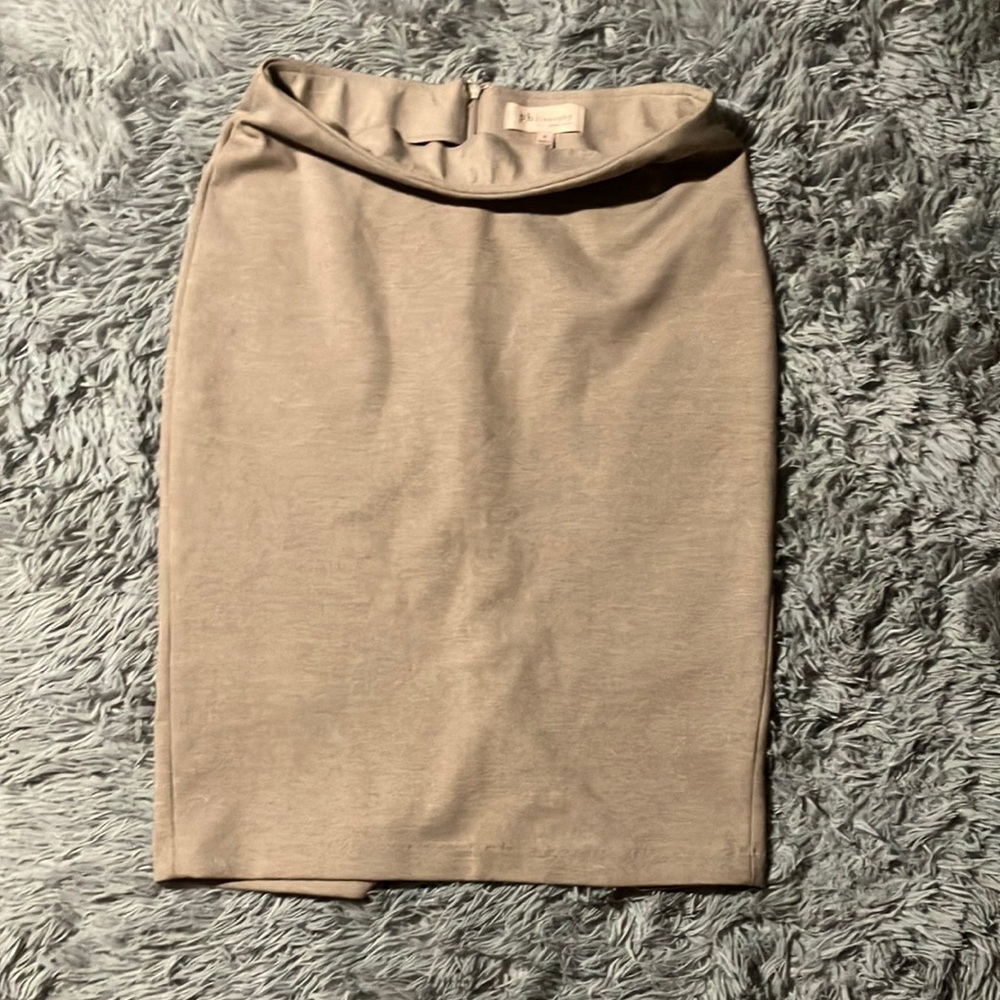 Light brown size 6 philosophy skirt with small slit in the back.